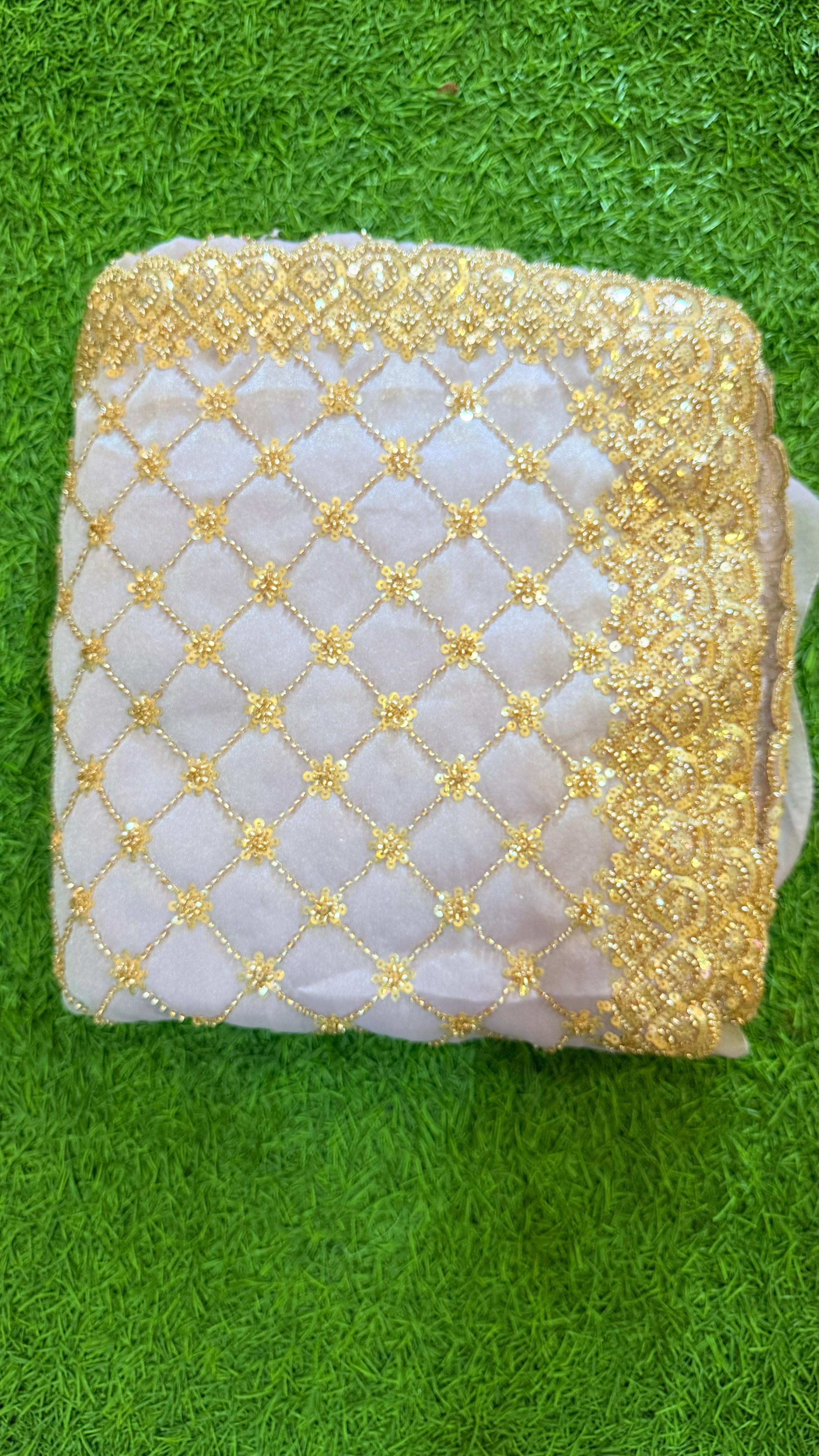 Luxurious Tora Silk Saree with Exquisite Cutglass and Pearl Handwork Tora Silk Saree with Fully Stitched Blouse