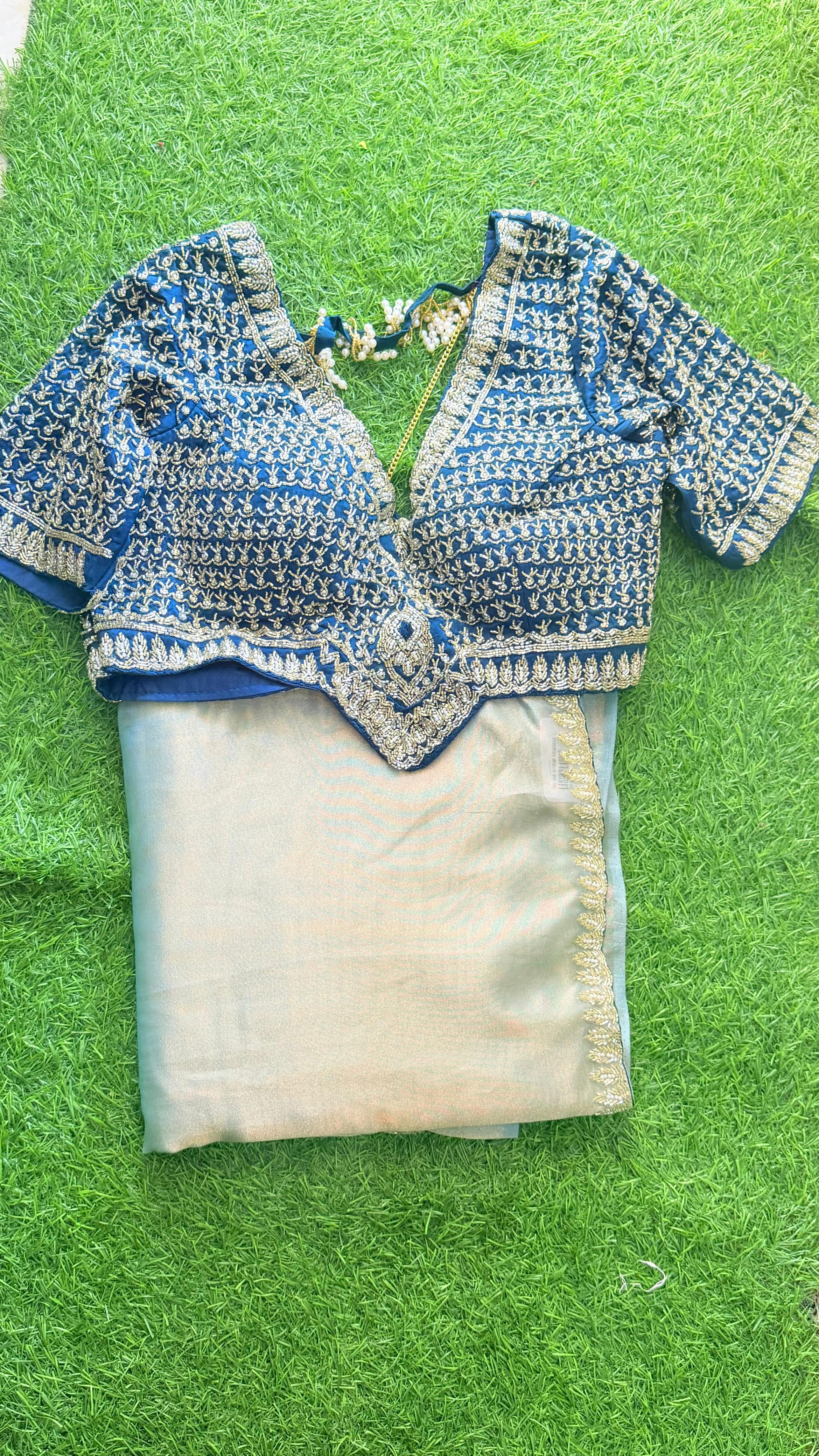 Luxurious Tora Silk Saree with Exquisite Cutglass and Pearl Handwork Tora Silk Saree with Fully Stitched Blouse