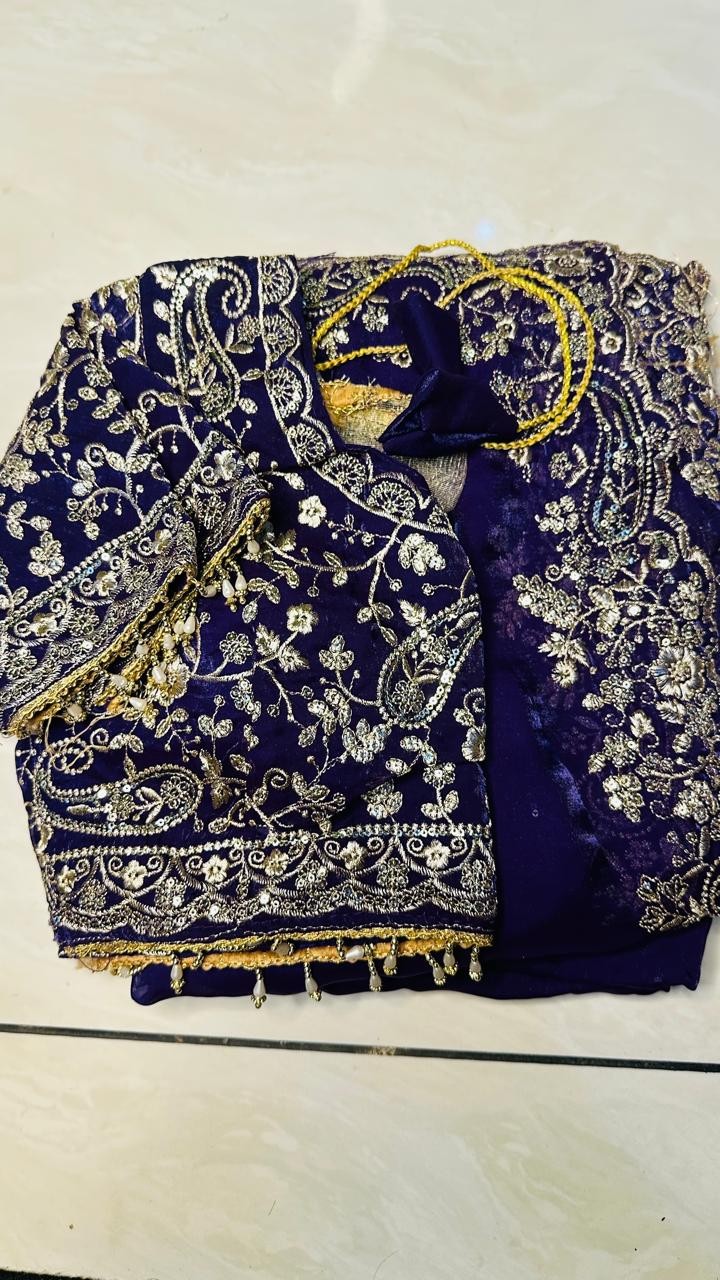 Luxurious BLUE Tora Silk Saree with Exquisite Cutglass and Pearl Handwork BLUE Tora Silk Saree with Fully Stitched Blouse