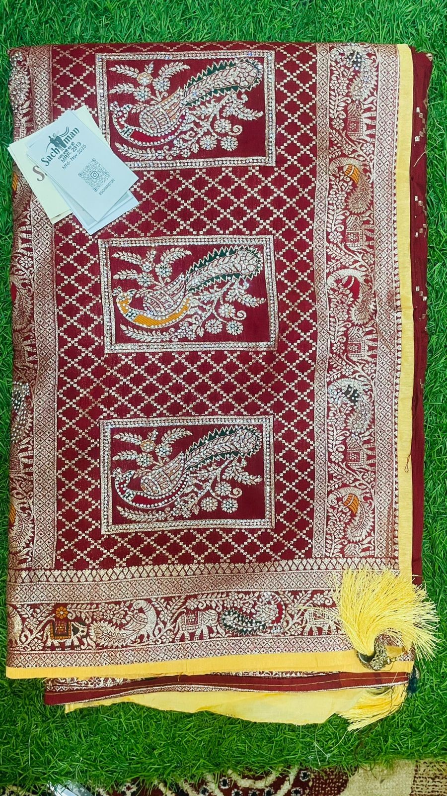 Luxurious maroon Tora Silk Saree with Exquisite Cutglass and Pearl Handwork maroon Tora Silk Saree with Fully Stitched Blouse