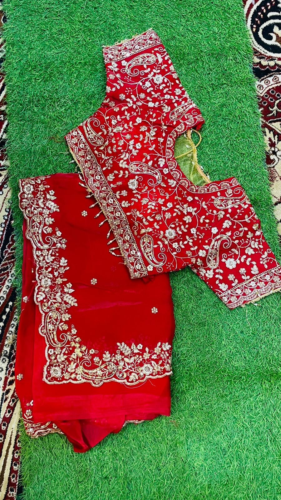 Luxurious red Tora Silk Saree with Exquisite Cutglass and Pearl Handwork red Tora Silk Saree with Fully Stitched Blouse